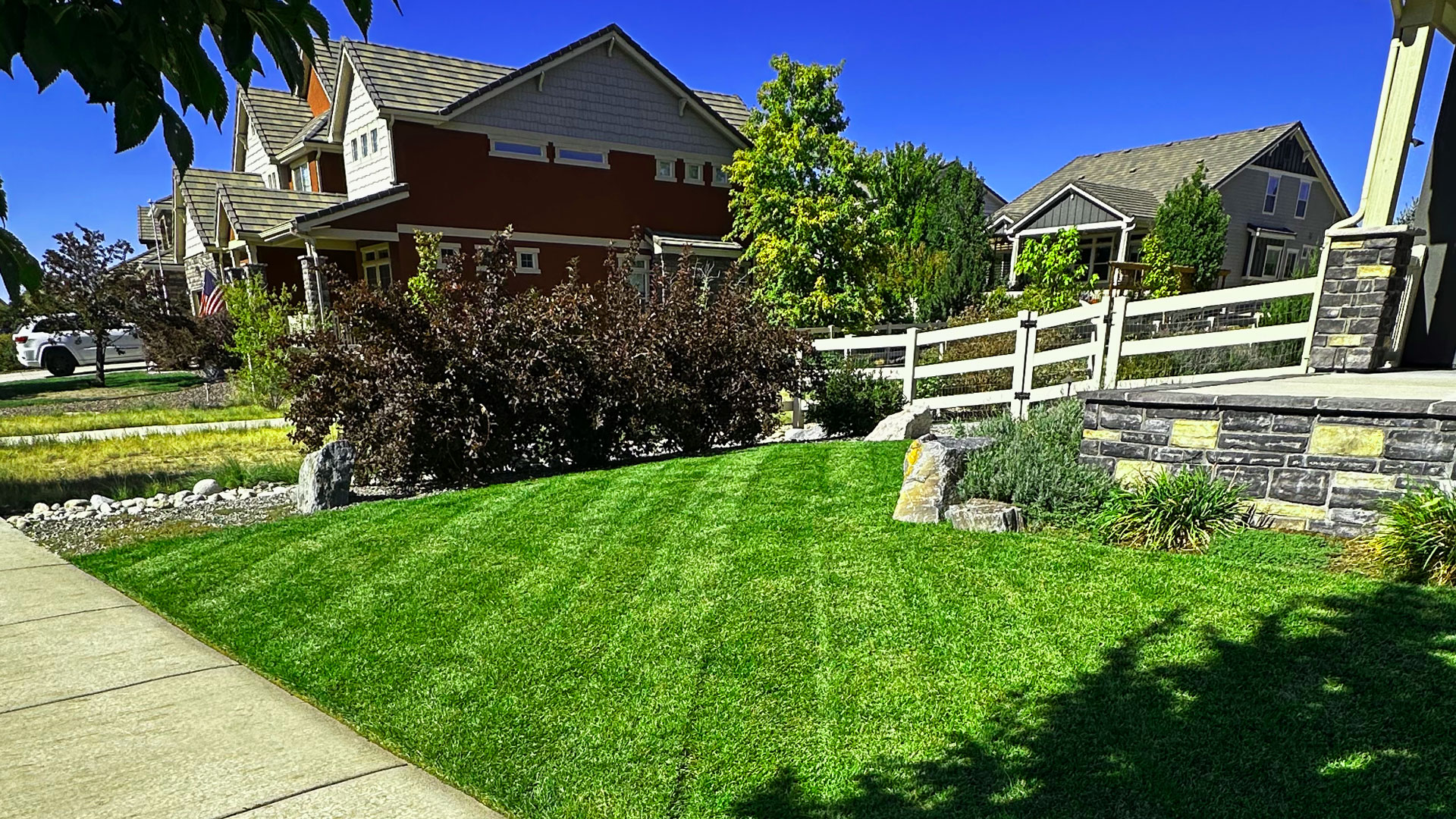 Freshly striped Erie Highlands front lawn on a sunny fall day